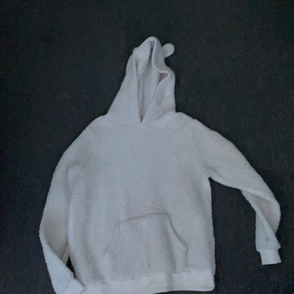 A white wool sweater